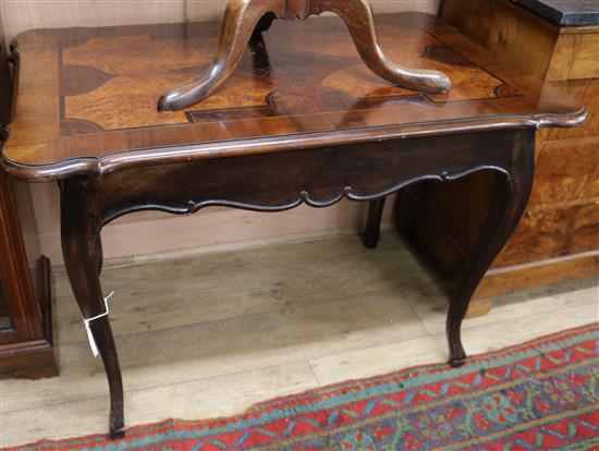A French walnut, maple, yew and sycamore marquetry topped centre table W.112cm